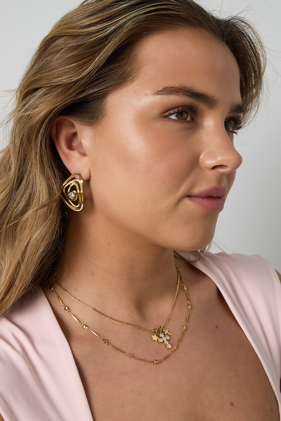 Necklace with cross and star charms